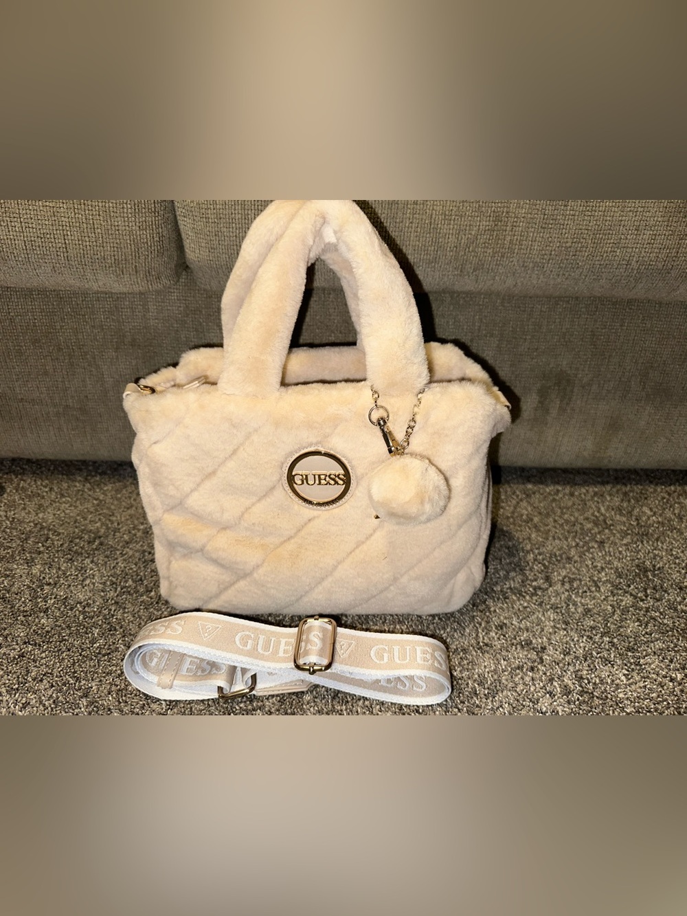 GUESS Cream Quilted Faux-Fur Tote Bag with Pom Charm